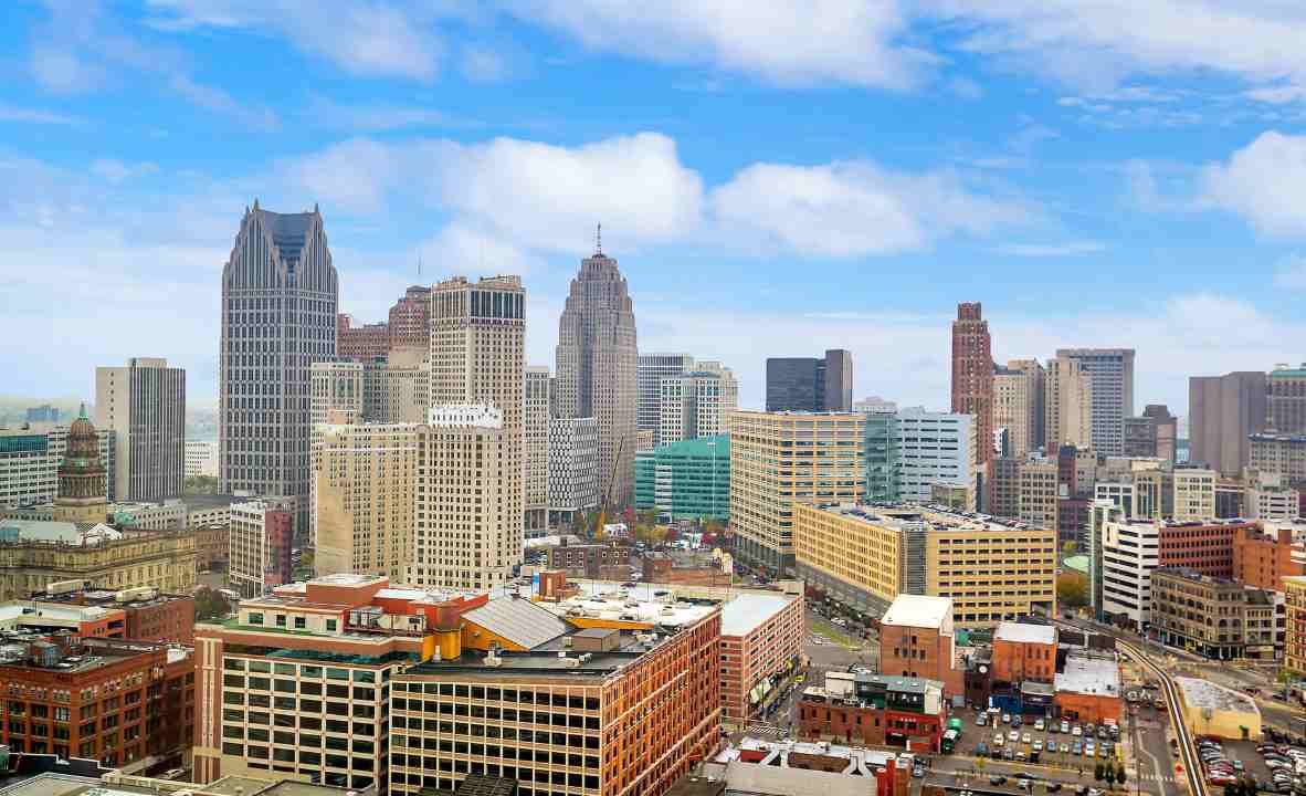 Which celebrated Michigan metropolis built its legendary reputation under the polished moniker of the "Motor City"?