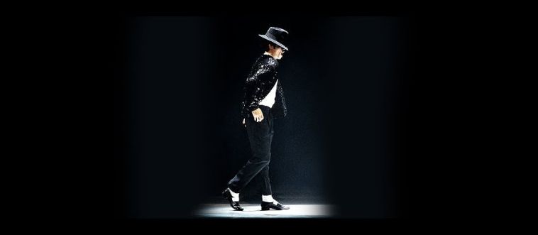 Which legendary performer redefined stage style and earned the title “The King of Pop” after debuting a gravity-defying moonwalk?